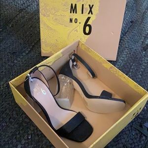 Cute black strapy heels.